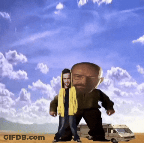 Man In Yellow Jacket Standing Next To Another Man GIF