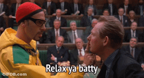 Man In Yellow Jacket Talking To Another Man With Relax Ya Batty GIF