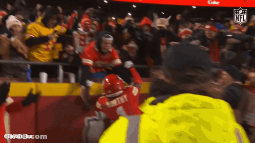 Man In Yellow Jacket With Number 1 GIF