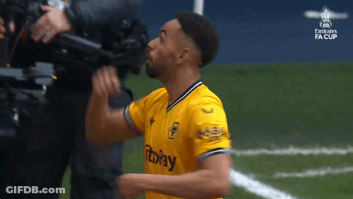 Man In Yellow Jersey Celebrating GIF