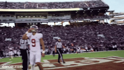 Man In Yellow Jersey Number 5 Throwing Football GIF