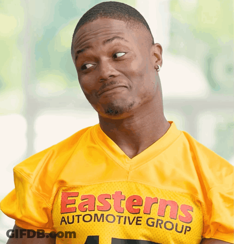 Man In Yellow Jersey Saying Easterns Automotive Group GIF