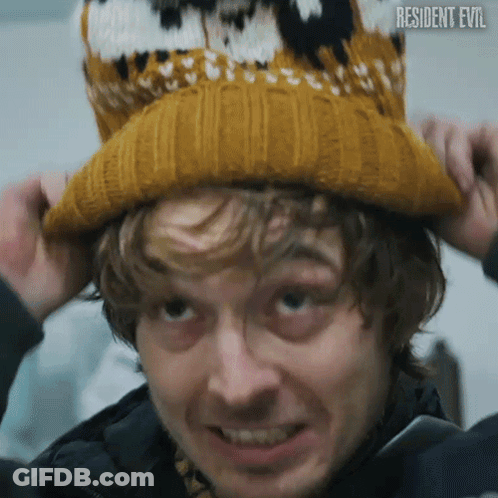 Man In Yellow Knitted Hat Resident Evil GIF