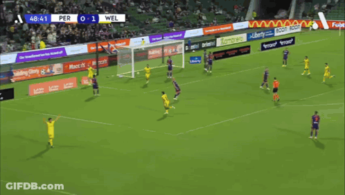 Man In Yellow OPPO Jersey Running On Soccer Field GIF