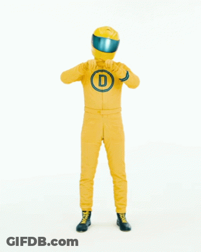 Man In Yellow Racing Suit Pointing To Pure Love GIF