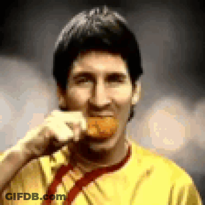 Man In Yellow Shirt And Red Tie Eating Food GIF