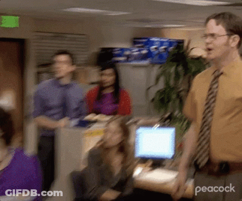 Man In Yellow Shirt And Tie In Front Of Computer GIF