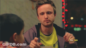 Man In Yellow Shirt At DMC Sign GIF