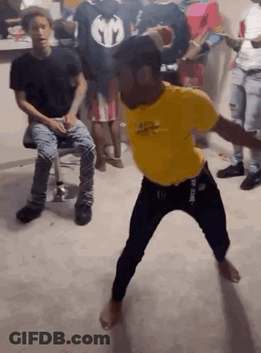 Man In Yellow Shirt Dancing GIF
