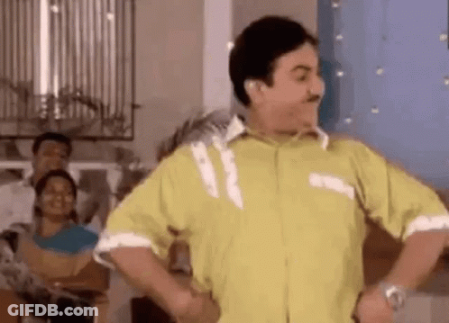 Man In Yellow Shirt Dancing Hands On Hips GIF