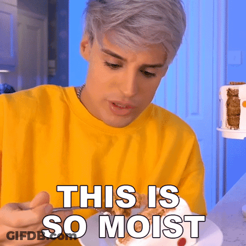 Man In Yellow Shirt Eating Cake Saying This Is So Moist GIF