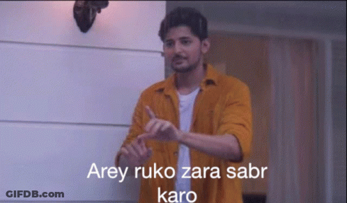 Man In Yellow Shirt Gesturing Arey Ruko Zara Sabr Karo GIF