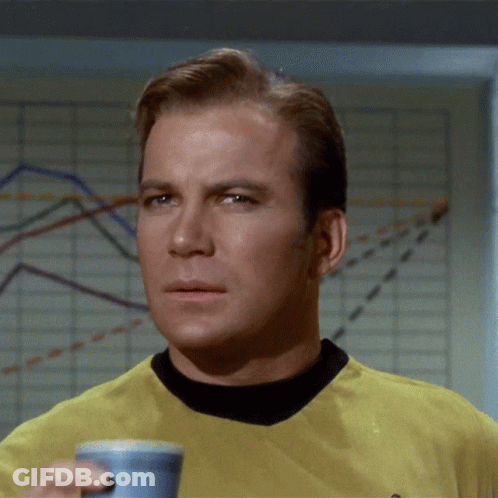 Man In Yellow Shirt Holding Blue Cup GIF