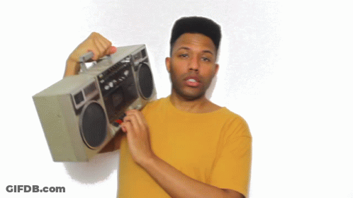 Man In Yellow Shirt Holding Boombox GIF