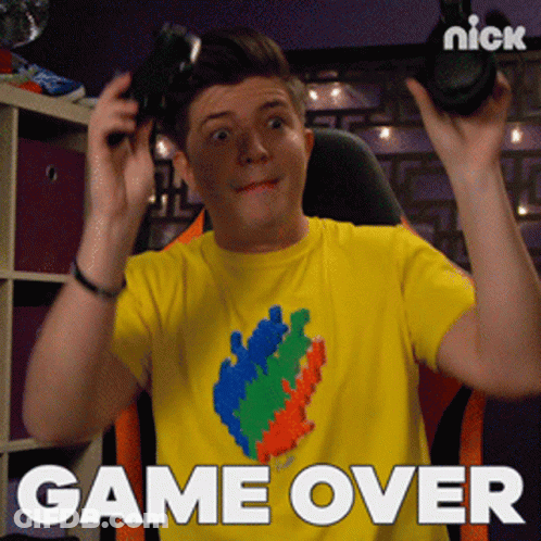 Man In Yellow Shirt Holding Controller Game Over GIF