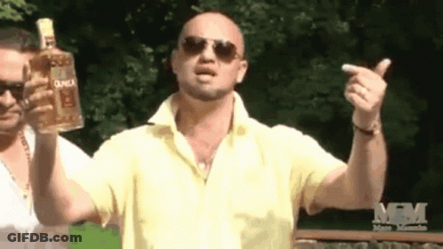 Man In Yellow Shirt Holding Duca Tequila GIF