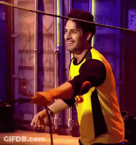Man In Yellow Shirt Holding Rope GIF
