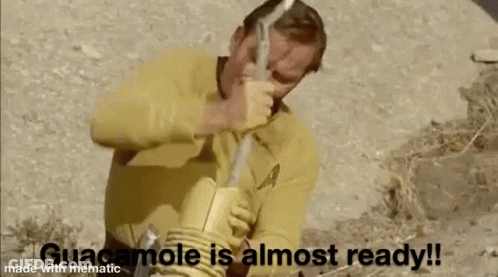 Man In Yellow Shirt Holding Stick And Rope Says Guacamole Is Almost Ready GIF