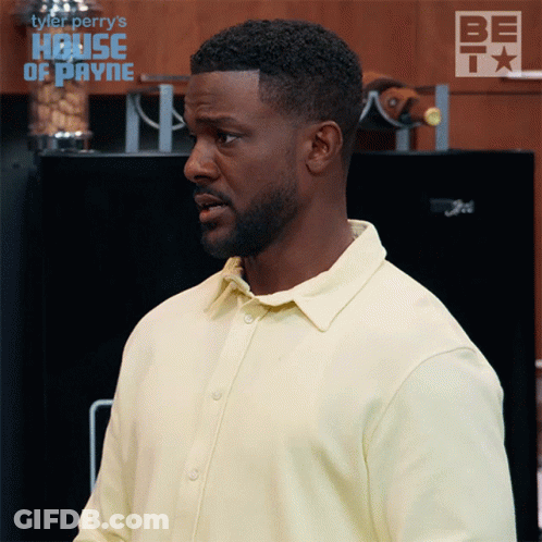 Man In Yellow Shirt In Front Of Refrigerator Saying Be GIF