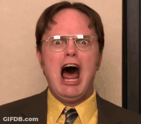 Man In Yellow Shirt Making Funny Face GIF