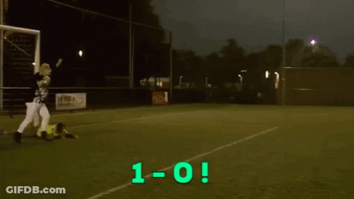 Man In Yellow Shirt Number 12 Holding Scoreboard GIF