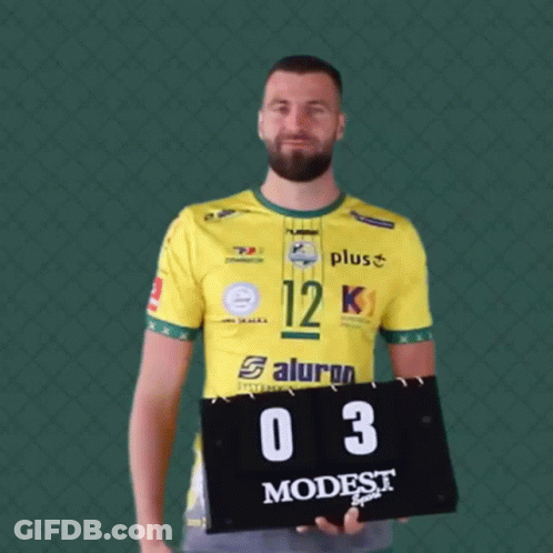 Man In Yellow Shirt Number 12 Holds Scoreboard GIF