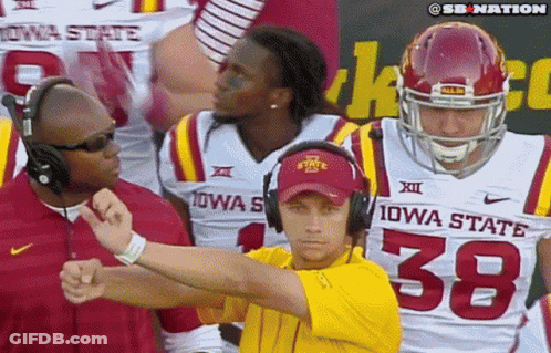 Man In Yellow Shirt Number 38 With Iowa State Football Players GIF