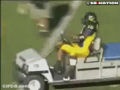 Man In Yellow Shirt On Golf Cart With SB Nation Logo GIF
