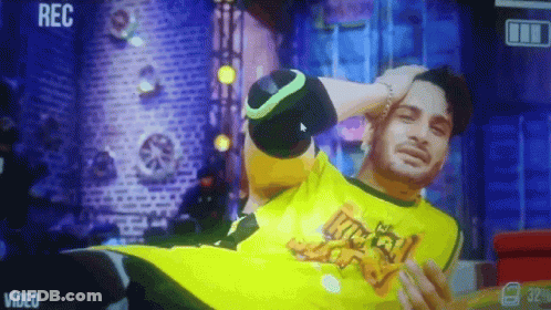 Man In Yellow Shirt Recorded On Video Screen GIF