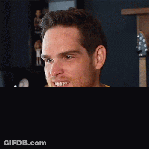 Man In Yellow Shirt Saying Good GIF