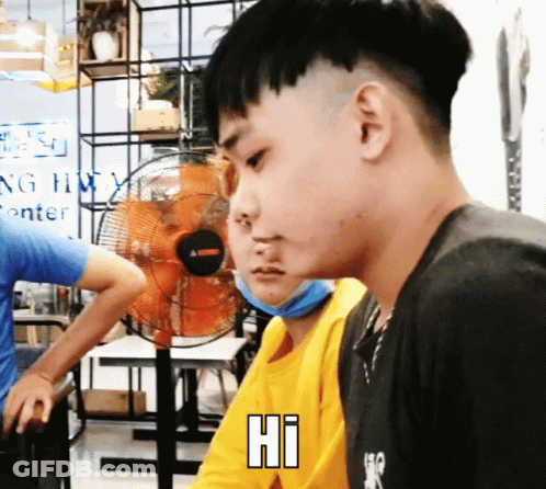 Man In Yellow Shirt Saying Hi To Another GIF