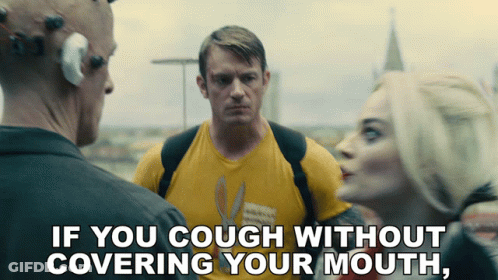 Man In Yellow Shirt Saying If You Cough Without Covering Mouth GIF
