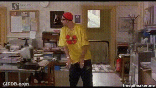Man In Yellow Shirt Saying Kung Fu Panda GIF
