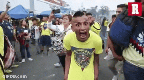 Man In Yellow Shirt Screaming GIF