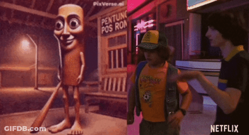 Man In Yellow Shirt Standing In Front Of Netflix Sign GIF