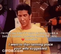 Man In Yellow Shirt Talking In Kitchen GIF