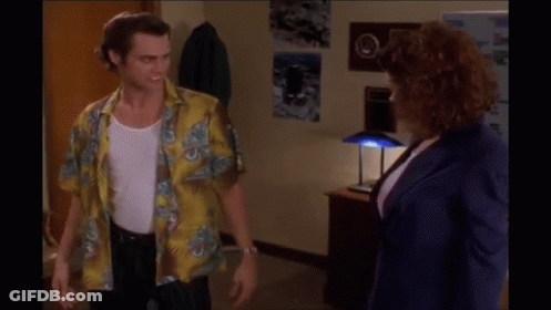 Man In Yellow Shirt Talking To Woman GIF
