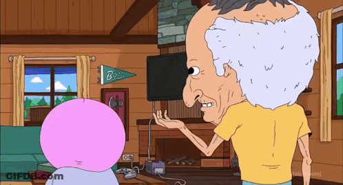 Man In Yellow Shirt Talking Under Bass Banner GIF