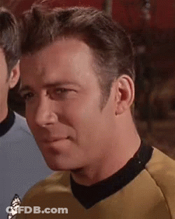 Man In Yellow Shirt With Black Collar GIF