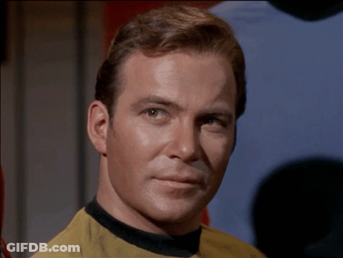 Man In Yellow Shirt With Black Collar GIF