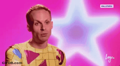Man In Yellow Shirt With Blue Star On Pink Background GIF