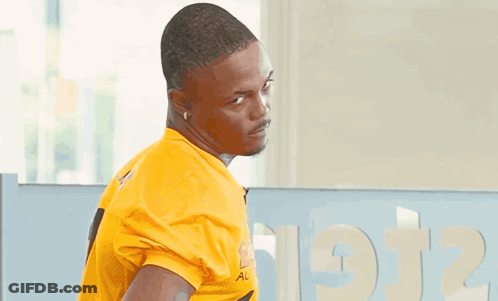 Man In Yellow Shirt With Easy Auto GIF