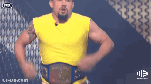 Man In Yellow Shirt With Hartford Belt GIF