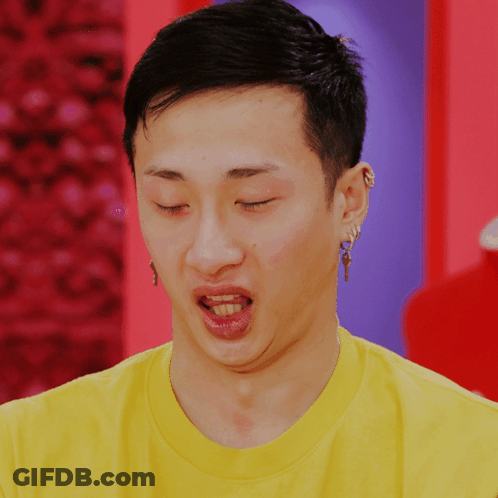 Man In Yellow Shirt With Key Earring GIF