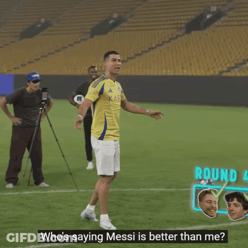 Man In Yellow Shirt With Letter J Kicks Soccer Ball GIF