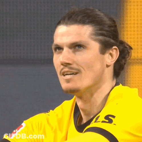 Man In Yellow Shirt With LS On Sleeve GIF