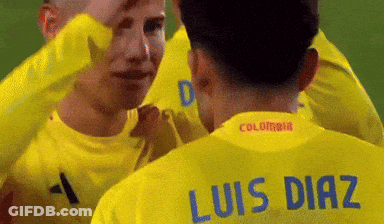 Man In Yellow Shirt With Luis Diaz Name GIF