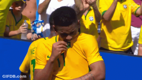 Man In Yellow Shirt With Number 1 GIF