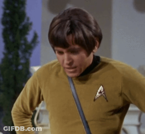 Man In Yellow Shirt With Star Trek Badge GIF