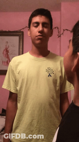 Man In Yellow Shirt With Tree GIF